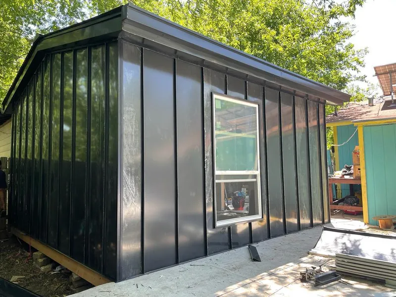 Black standing seam metal wall panels for Metal Roof Installation in West Hartford
