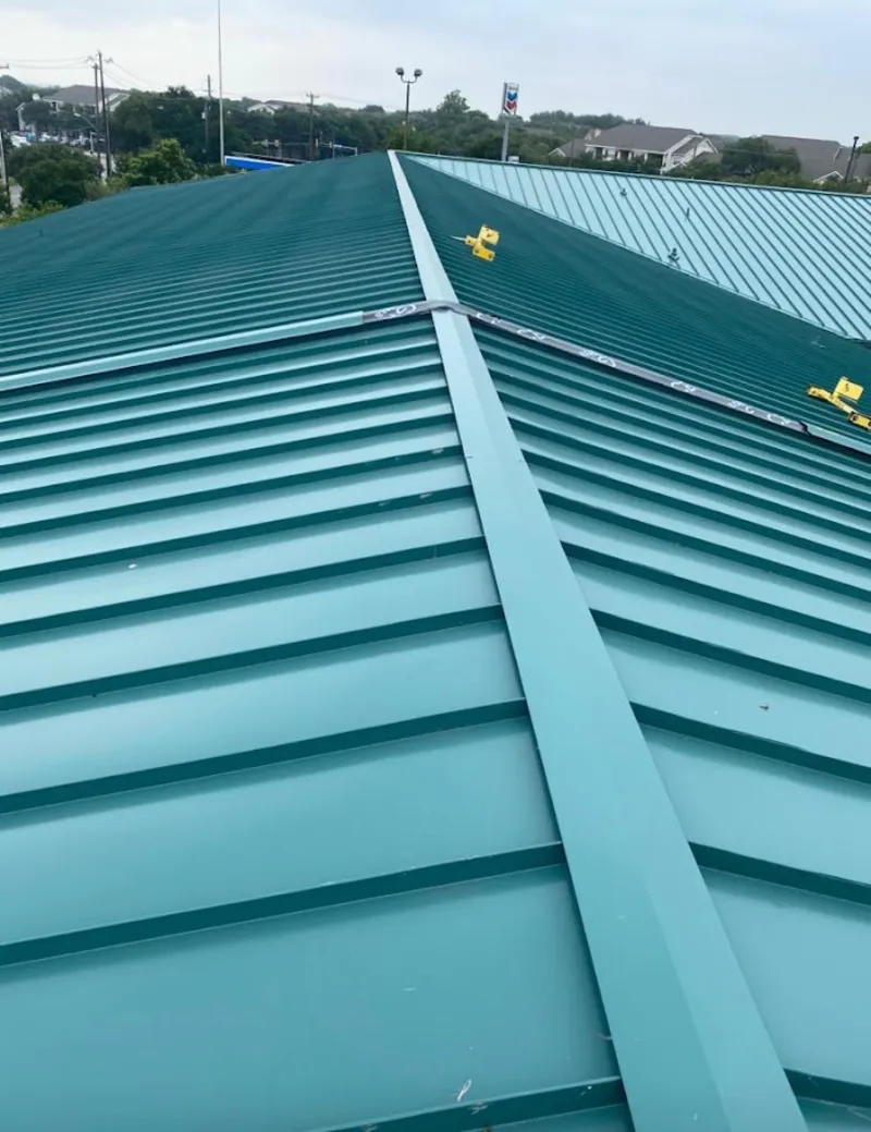 Green commercial metal roof ridge and valley for Metal Roof Repair in West Hartford
