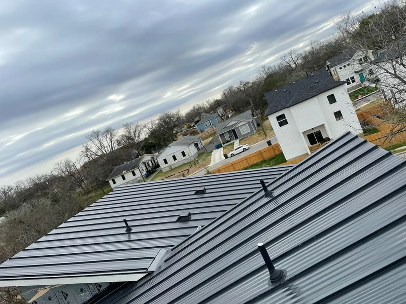 Standing seam metal roof panels with vents for Skylight Repair in West Hartford
